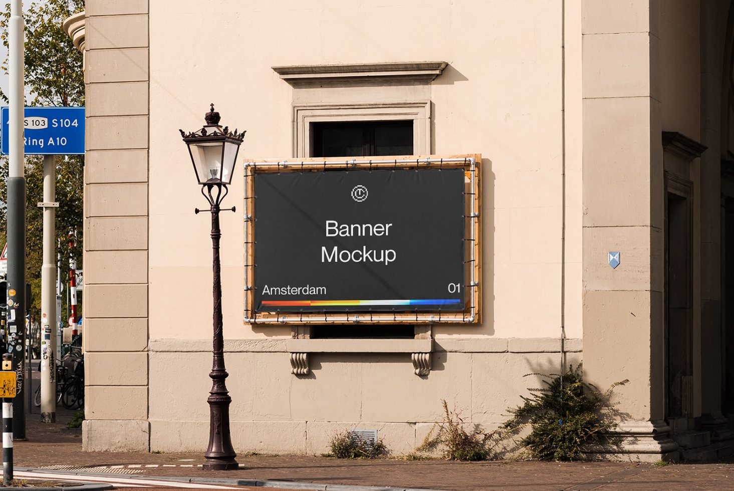 Outdoor urban banner mockup on building exterior for advertising design presentation, clear sky, streetlight, Amsterdam sign visible.